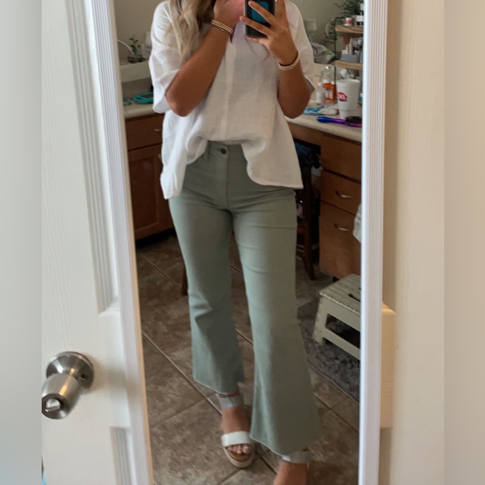 green flare jeans
